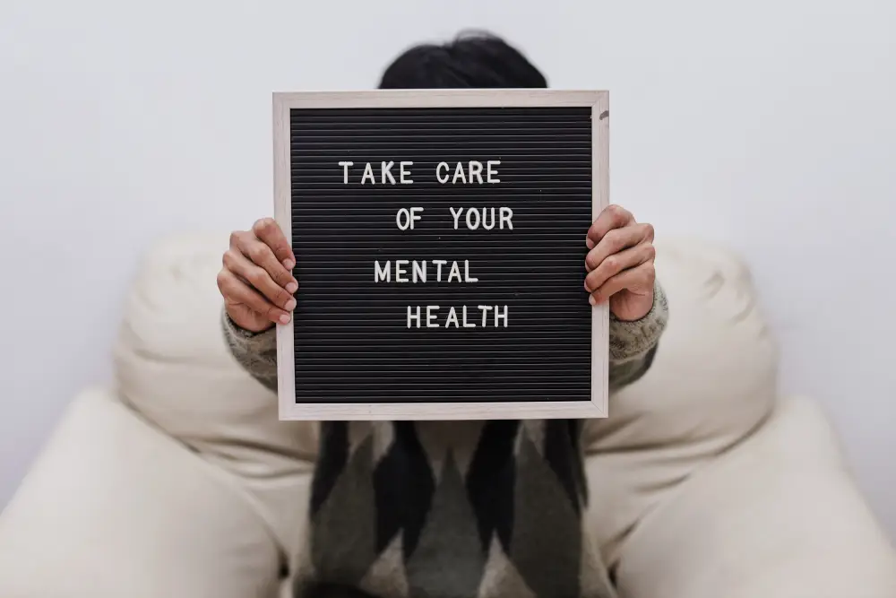 Doctor at CHI Health GP clinic in Orchard Road consulting a patient about anxiety and stress
