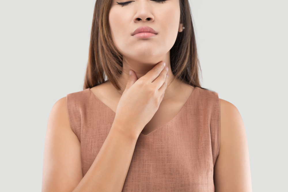 Illustration of throat irritation caused by allergies or acid reflux